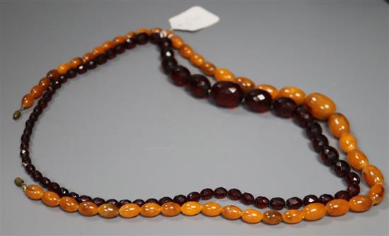 Two faux amber bead necklaces.